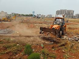 Raipur News : रायपुर मा अवैध प्लाटिंग ऊपर निगम के डंडा: 3 एकड़ के अवैध कब्जा ल ढहाइस, 26 गोडाउन ल नोटिस